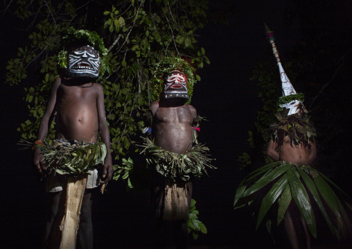 Men during a Malagan tatuana masks dance, New Ireland Province, Langania, Papua New Guinea