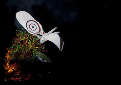 Dancer with a giant mask during a Baining tribe fire dance, East New Britain Province, Rabaul, Papua New Guinea