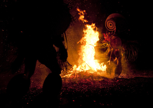 Dancer with a giant mask during a Baining tribe fire dance, East New Britain Province, Rabaul, Papua New Guinea