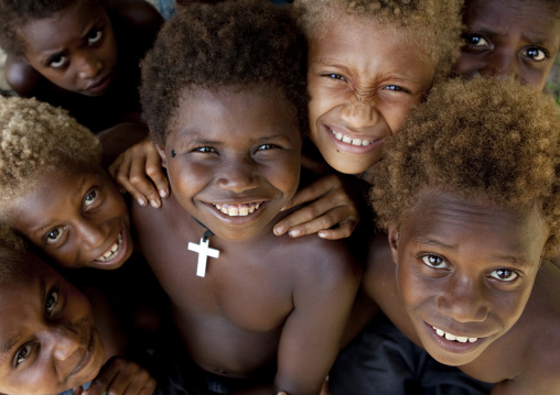 Smiling boys with blonde hair, East New Britain Province, Rabaul, Papua New Guinea