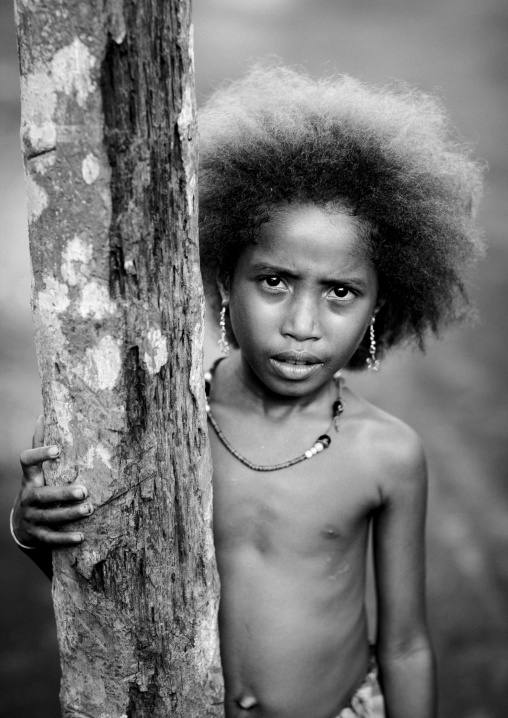 Portrait of an islander girl with blonde hair, Milne Bay Province, Trobriand Island, Papua New Guinea
