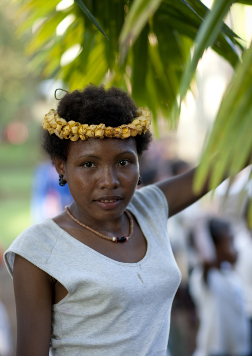 Portrait of a girl with flowers in the hair, Milne Bay Province, Trobriand Island, Papua New Guinea