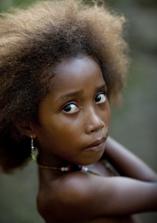 Portrait of an islander girl with blonde hair, Milne Bay Province, Trobriand Island, Papua New Guinea