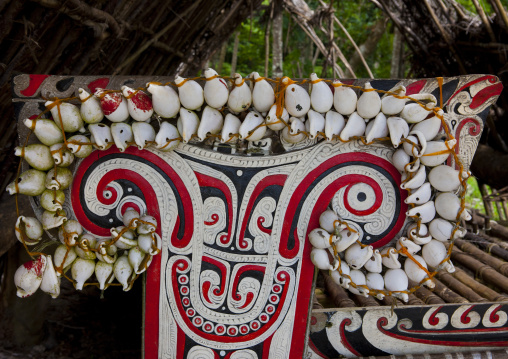 Traditional canoe boe with carved and painted decorations, Milne Bay Province, Trobriand Island, Papua New Guinea