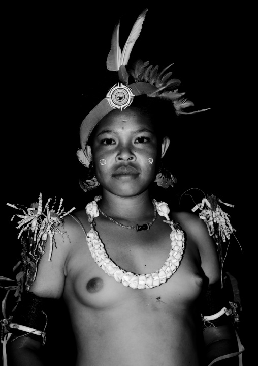 Portrait of a topless tribal woman, Milne Bay Province, Trobriand Island, Papua New Guinea