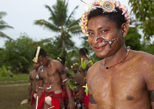 Tribal dancers in traditional clothing during a sing-sing, Milne Bay Province, Trobriand Island, Papua New Guinea
