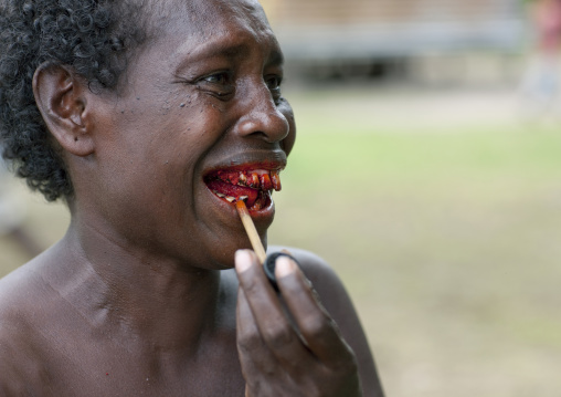 Woman chewing betel nut, Autonomous Region of Bougainville, Bougainville, Papua New Guinea
