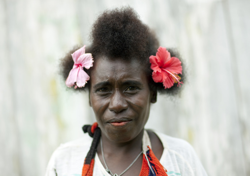 Portrait of a woman wearing flowers in the hair, Autonomous Region of Bougainville, Bougainville, Papua New Guinea