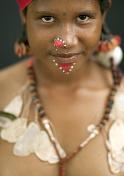 Portrait of a tribal woman in traditional clothing, Milne Bay Province, Trobriand Island, Papua New Guinea