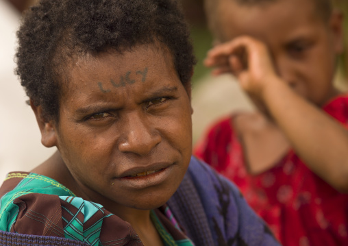 Highlander woman with her own name tatooed on her forehead, Western Highlands Province, Mount Hagen, Papua New Guinea