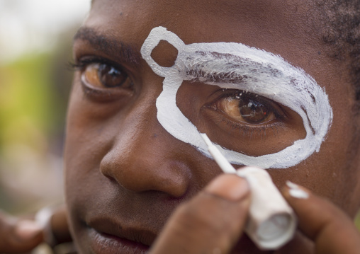 Highlander boy with traditional makep during a sing-sing, Western Highlands Province, Mount Hagen, Papua New Guinea