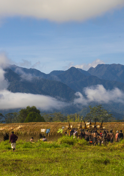Long house in front of a mountain, Western Highlands Province, Mount Hagen, Papua New Guinea