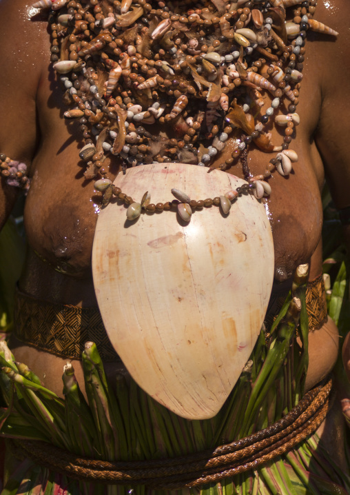 Melpa tribe woman with giant bailer shell during a sing sing, Western Highlands Province, Mount Hagen, Papua New Guinea