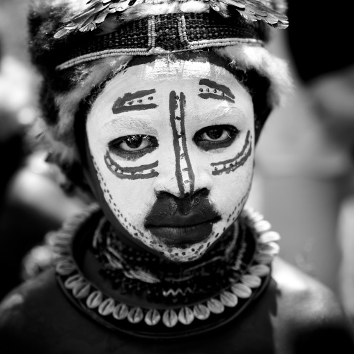 Portrait of a Huli tribe boy during a sing-sing, Western Highlands Province, Mount Hagen, Papua New Guinea