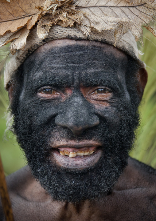 Whagi man tribe with black face during a sing-sing, Western Highlands Province, Mount Hagen, Papua New Guinea