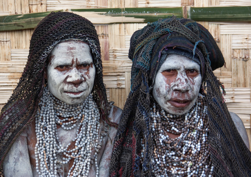 Mourning women with job tears necklaces, Western Highlands Province, Mount Hagen, Papua New Guinea