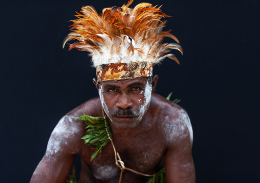Portrait of a man from Paplieng tribe in traditional clothing, New Ireland Province, Kavieng, Papua New Guinea