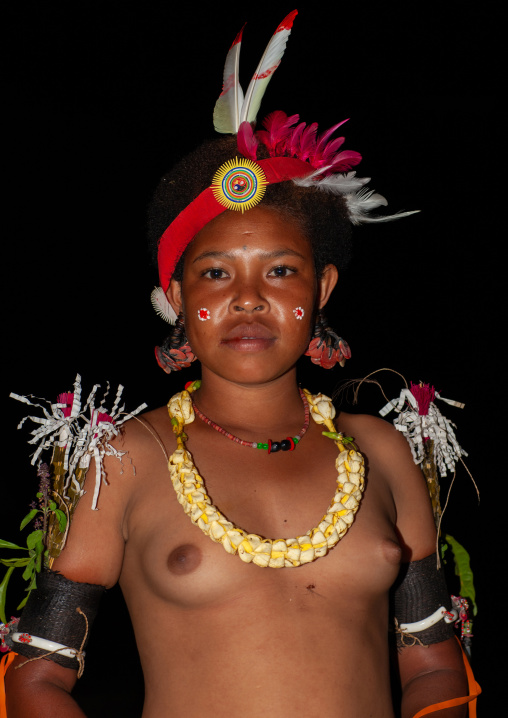 Portrait of a topless tribal woman, Milne Bay Province, Trobriand Island, Papua New Guinea