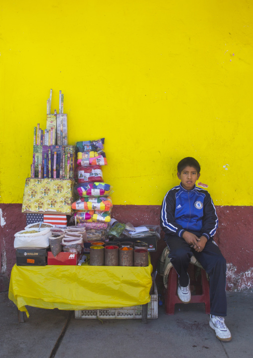Child Selling Food In The Street, Cuzco, Peru
