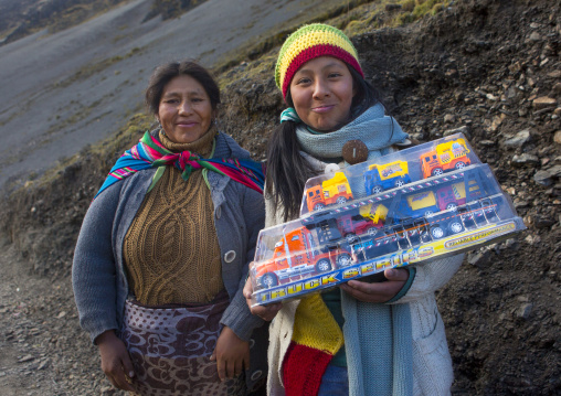 Women With A Toy Truck Bought During Qoyllur Riti Festival, Ocongate Cuzco, Peru