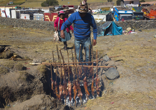 Man Cooking Cuys, Qoyllur Riti, Ocongate Cuzco, Peru
