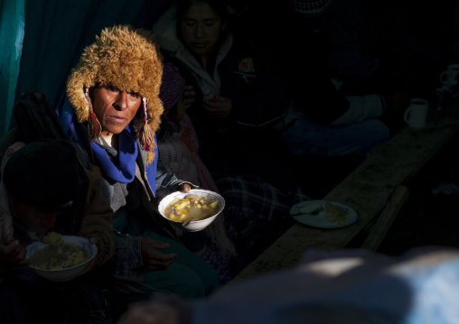 Peruvian Man Eating During The Qoyllur Riti Festival, Cuzco, Peru