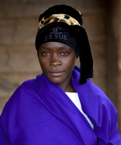 Batwa tribe woman with a jesus headwear, Western Province, Cyamudongo, Rwanda
