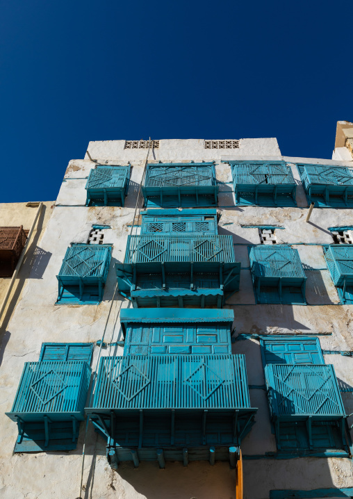 Historic house with blue wooden mashrabiyas in al-Balad quarter, Mecca province, Jeddah, Saudi Arabia