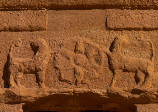 Rosette and lions carved on a tomb in al-Hijr archaeological site in Madain Saleh, Al Madinah Province, Alula, Saudi Arabia