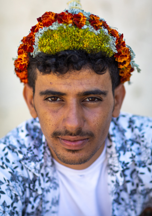 Portrait of a flower man wearing a floral crown on the head, Jizan province, Addayer, Saudi Arabia
