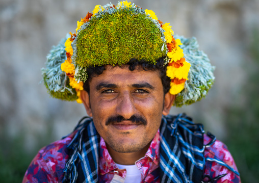 Portrait of a flower man wearing a floral crown on the head, Jizan province, Addayer, Saudi Arabia
