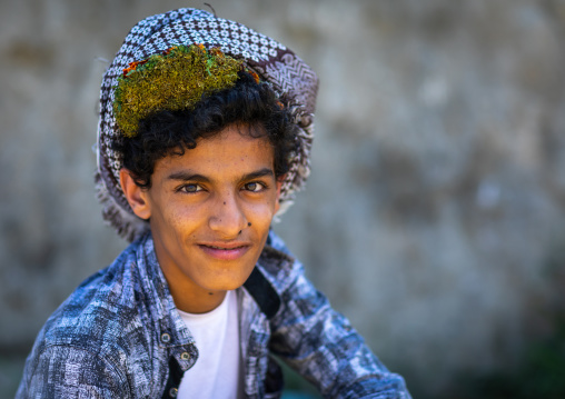 Portrait of a flower man wearing a floral crown on the head, Jizan province, Addayer, Saudi Arabia