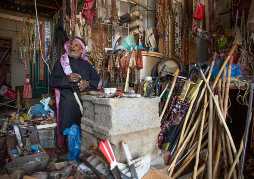 Saudi man selling antique stuff in a shop, Najran Province, Najran, Saudi Arabia