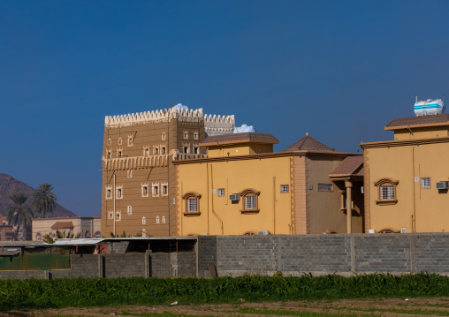Traditional old mud house and modern one, Najran Province, Najran, Saudi Arabia