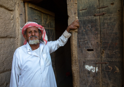 Portrait of a saudi man in front of his house, Najran Province, Najran, Saudi Arabia