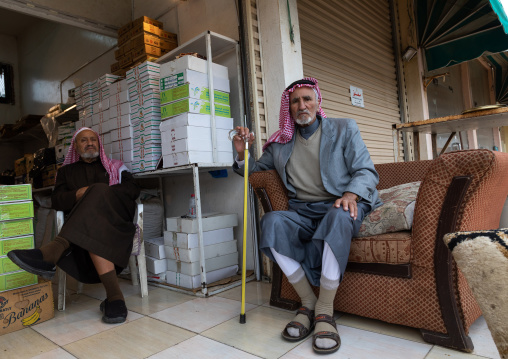 Saudi men selling dates in a market, Al-Bahah region, Al-Bahah, Saudi Arabia