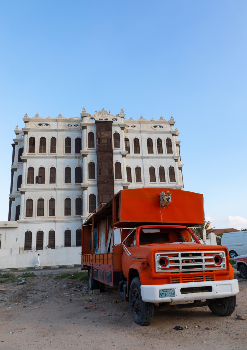 Red truck with hives inside in front of Shubra palace, Mecca province, Taïf, Saudi Arabia