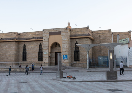 Boys playing in front of abdullah bin abbas mosque, Mecca province, Taïf, Saudi Arabia
