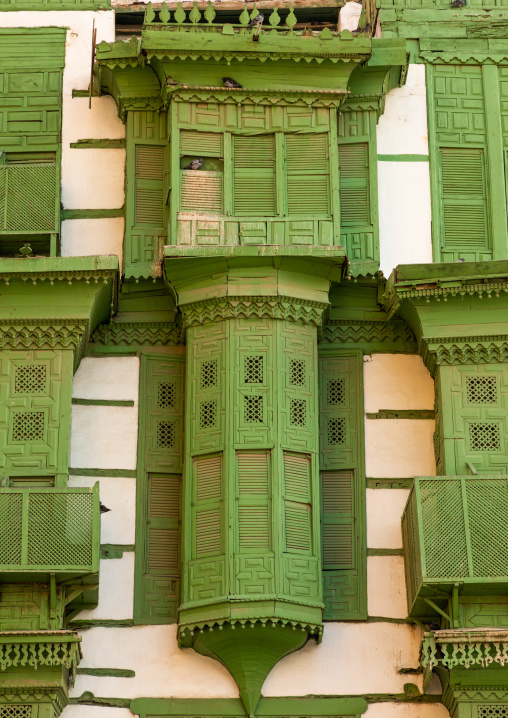 Old house with green wooden mashrabiya in al-Balad quarter, Mecca province, Jeddah, Saudi Arabia