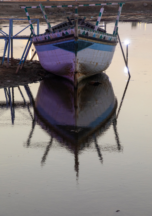 Wooden boat in a harbour at dusk, Jizan Province, Jizan, Saudi Arabia