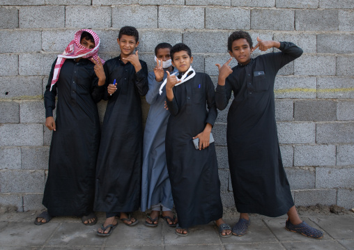 Portrait of farasani boys dressed in black, Red Sea, Farasan, Saudi Arabia
