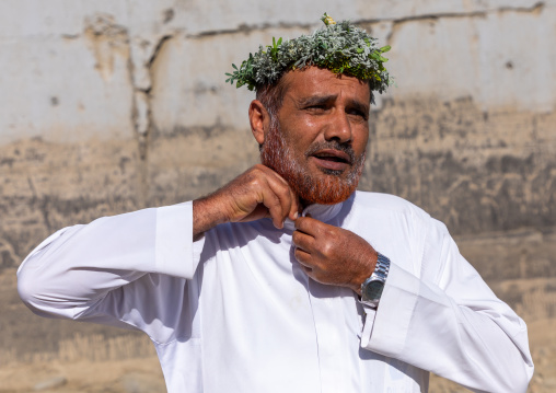 Portrait of a flower man wearing a floral crown on the head, Jizan Province, Addayer, Saudi Arabia