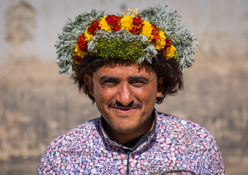 Portrait of a flower man wearing a floral crown on the head, Jizan Province, Addayer, Saudi Arabia
