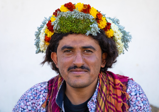 Portrait of a flower man wearing a floral crown on the head, Jizan Province, Addayer, Saudi Arabia