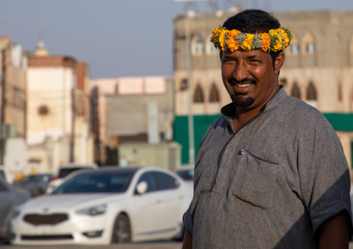 Portrait of a flower man wearing a floral crown on the head, Jizan Province, Sabya, Saudi Arabia