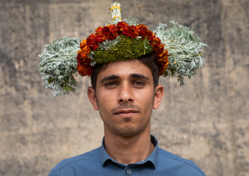 Portrait of a flower man wearing a floral crown on the head, Jizan Province, Addayer, Saudi Arabia