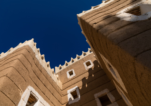 Traditional mud house against blue sky, Najran Province, Najran, Saudi Arabia