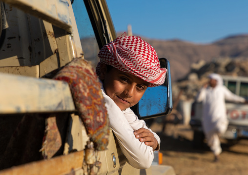 Saudi boy in the camel market, Najran Province, Najran, Saudi Arabia