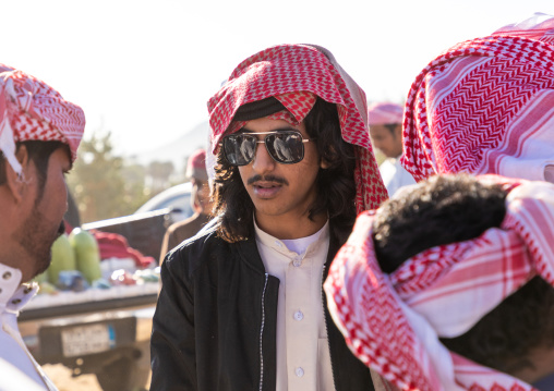 Saudi young men with keffiehs and sunglasses, Najran Province, Najran, Saudi Arabia