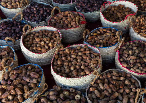 Dates in baskets for sale in a market, Najran Province, Najran, Saudi Arabia
